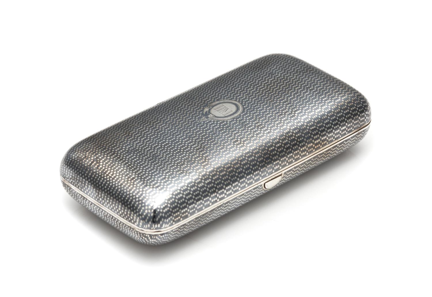 A Russian Niello Silver Cigarette Case, Maker's Mark Cyrillic P.Ch, Assay of Aleksandr Smirnov, Moscow, 1866, the patterned niello deco