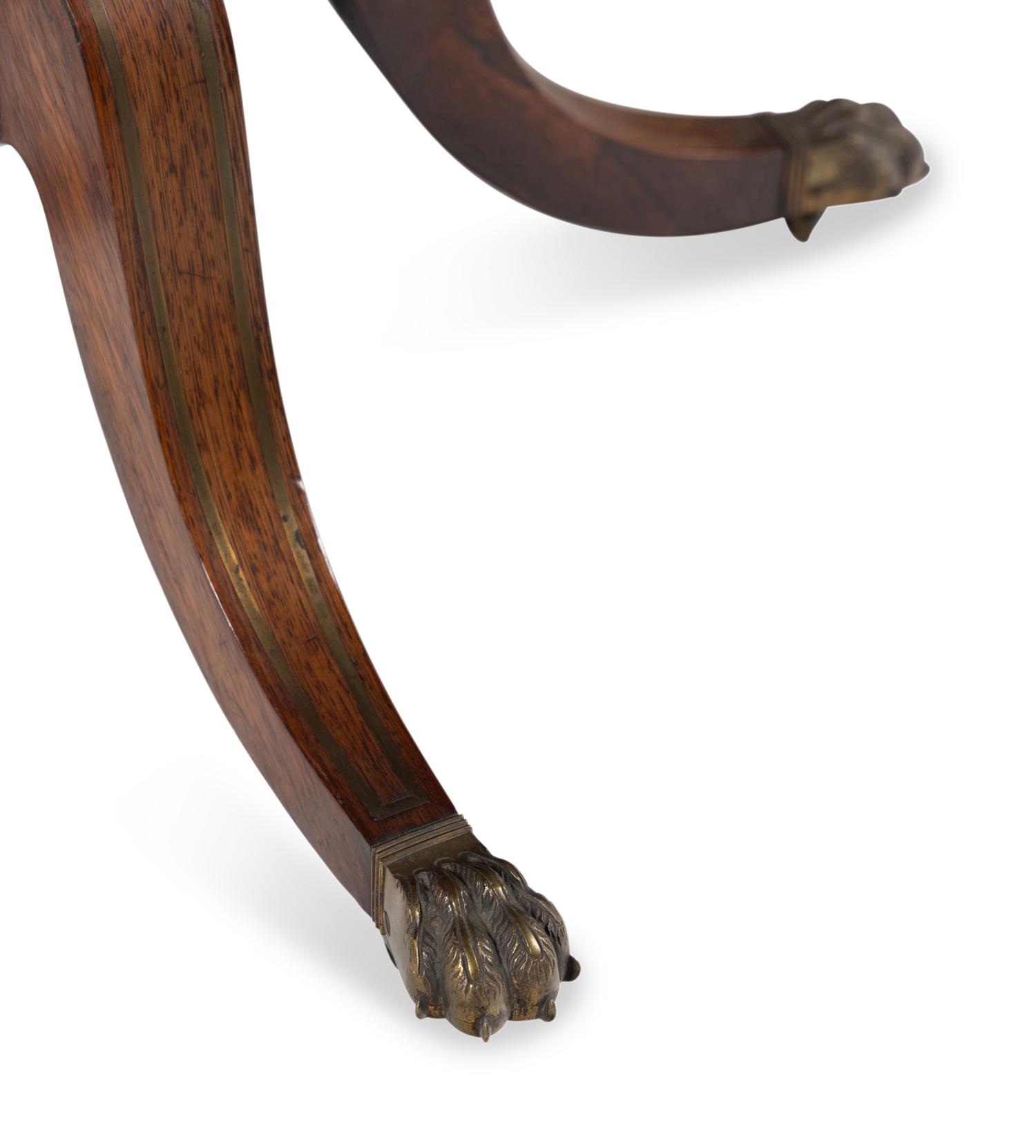 A Regency Rosewood and Brass Inlaid Game Table