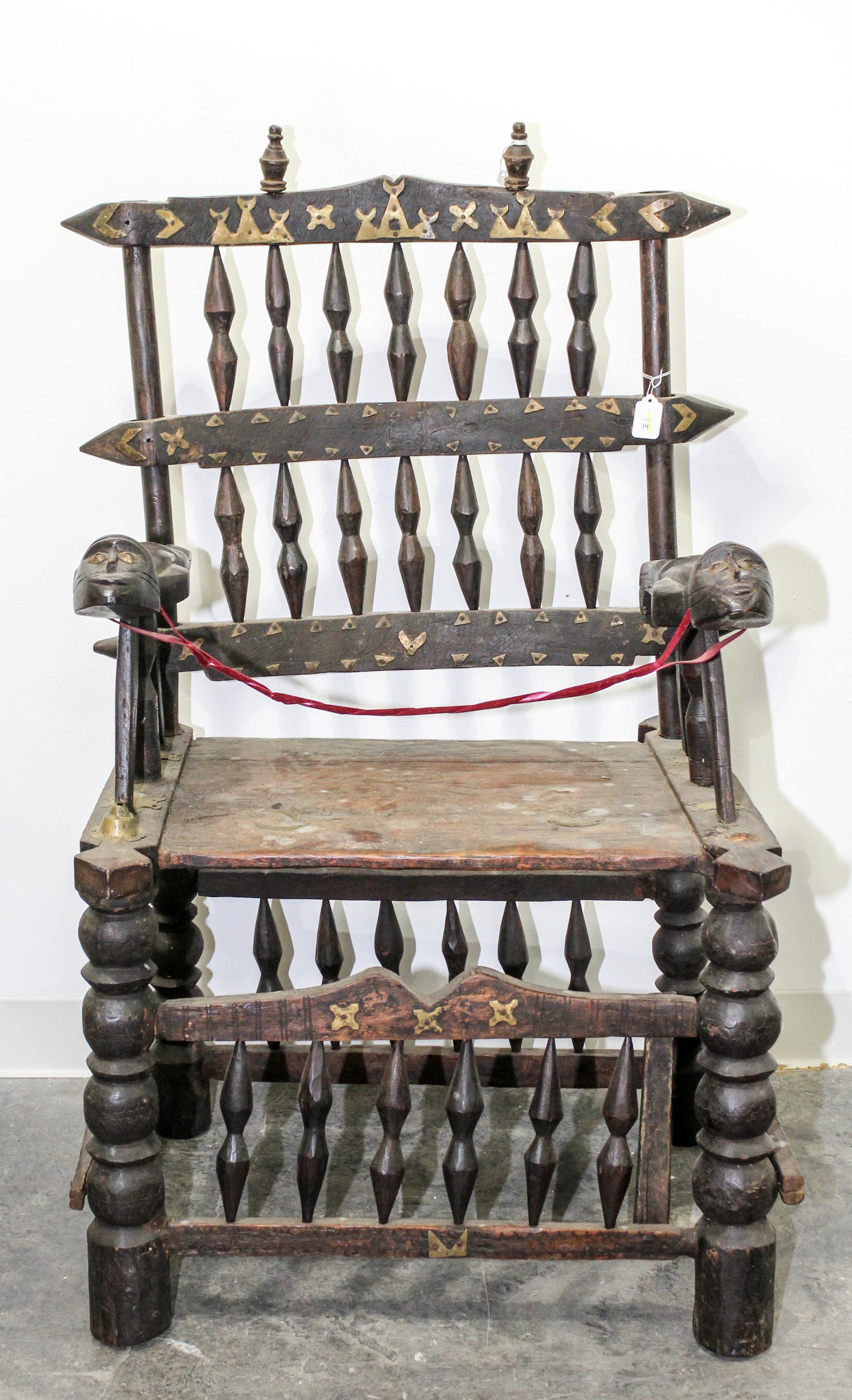 An African Carved Wood and Brass Throne Chair Height 44 inches.