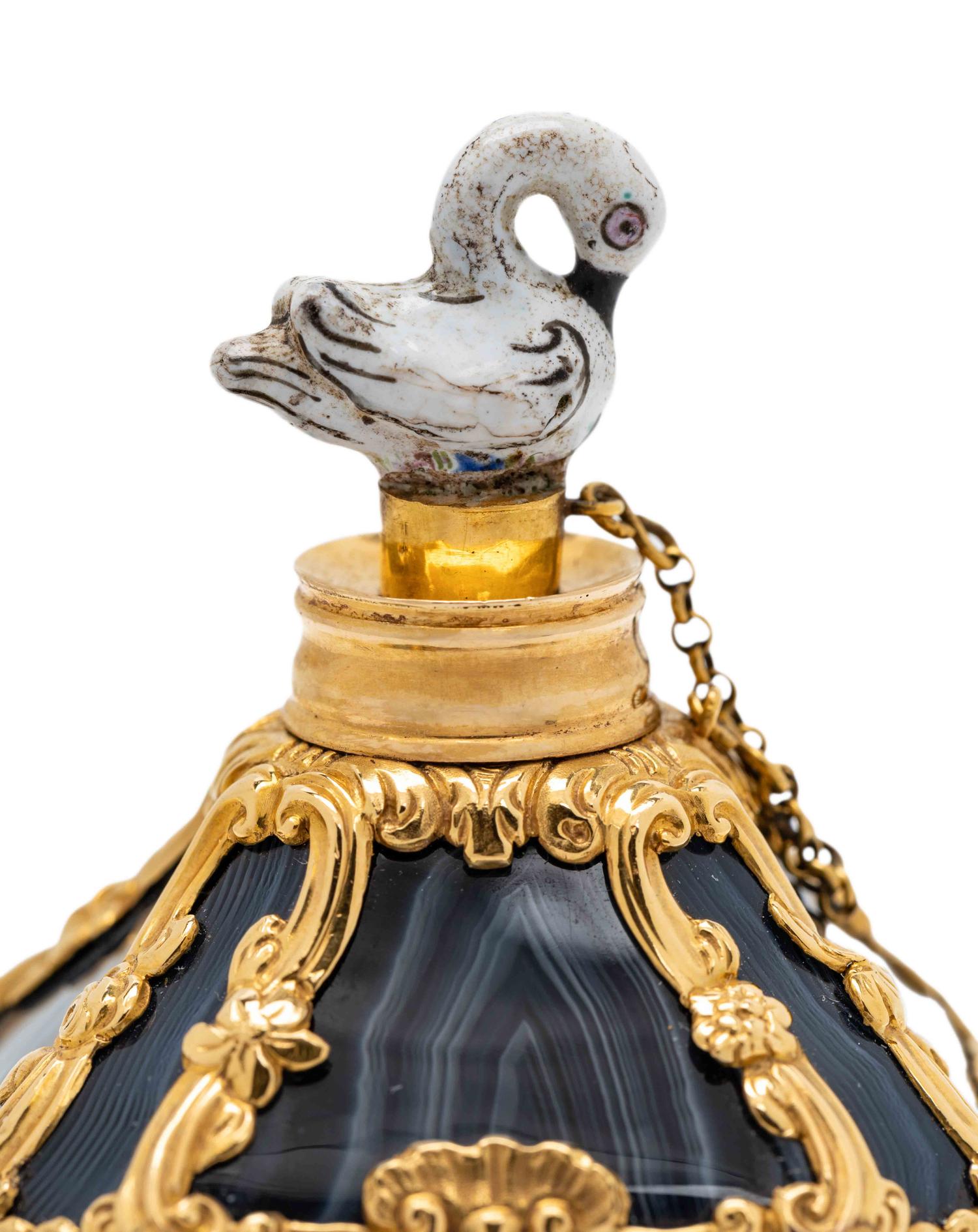 A George III Gold-Mounted Agate and Enameled Scent Bottle, Snuff Box and Patch Box