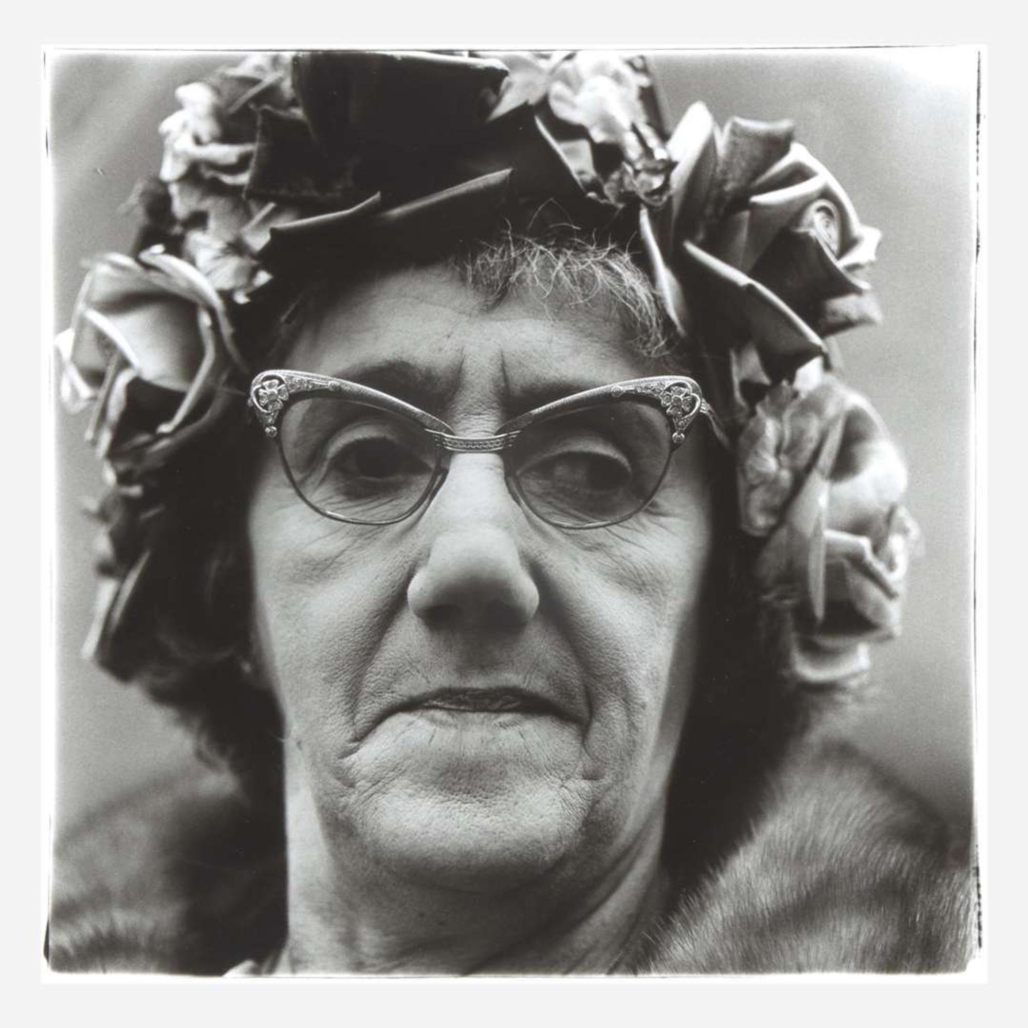 Diane Arbus (American, 1923-1971) Woman in a Rose Hat, N.Y.C.