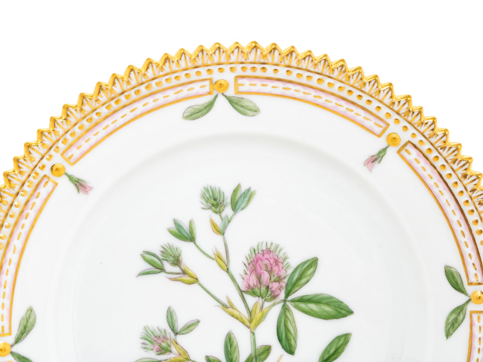 A Set of Fourteen Royal Copenhagen Flora Danica Bread Plates