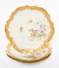 A Group of Three Limoges Plates Diameter 9 inches.
