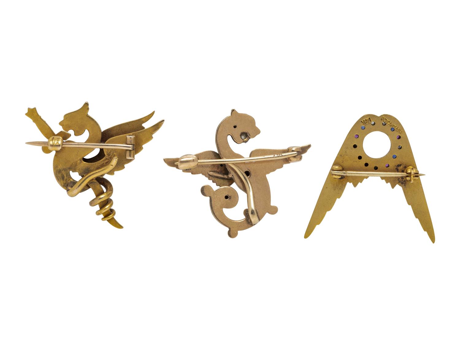 COLLECTION OF YELLOW GOLD BROOCHES