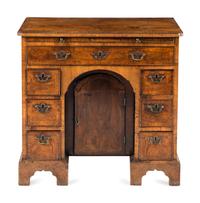 A George I Walnut Kneehole Desk