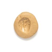 A Roman Carnelian Intaglio with the God Dionysus Teasing a Goat with Grapes