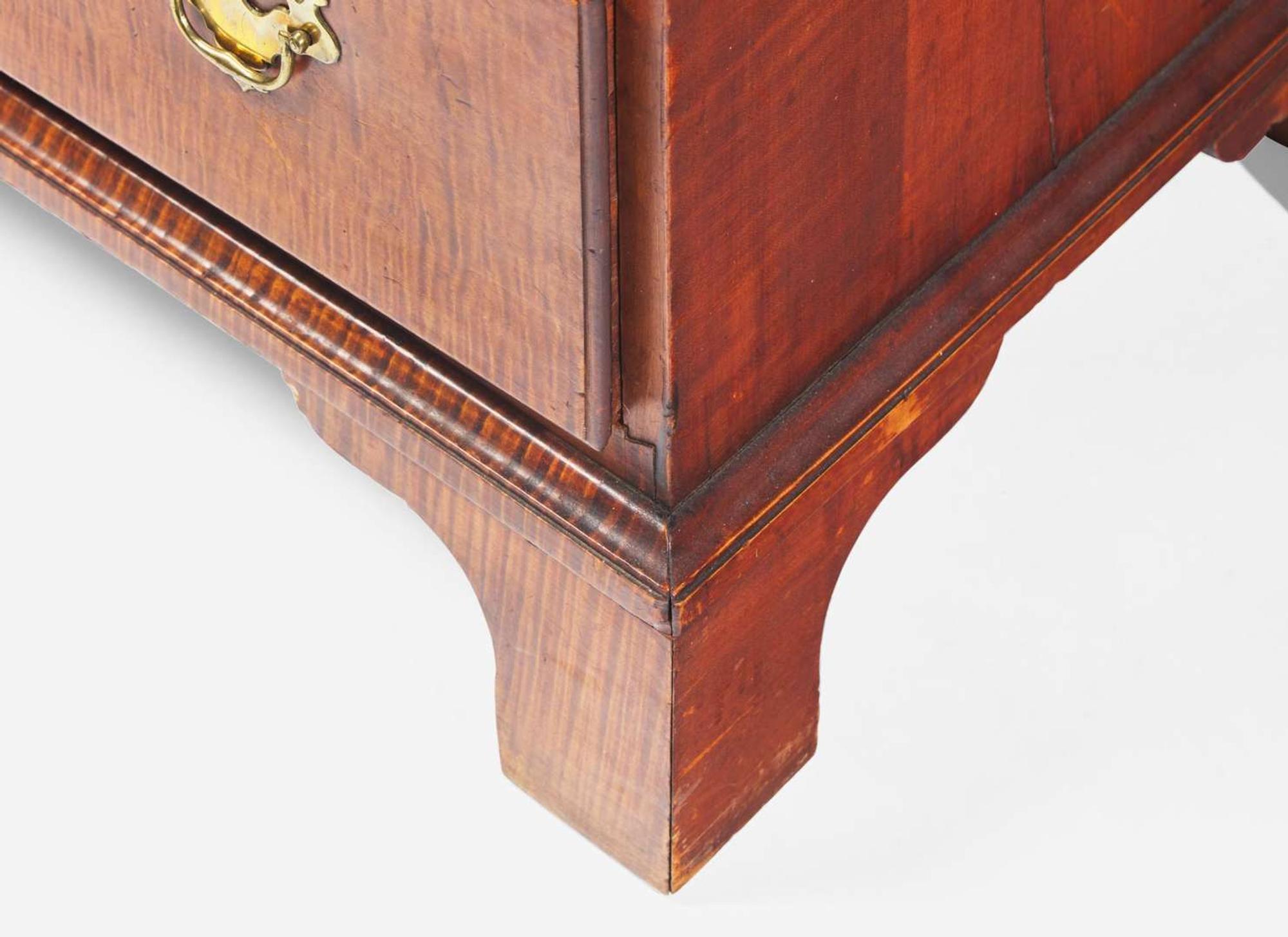 A Chippendale figured maple chest of drawers, New England, late 18th century