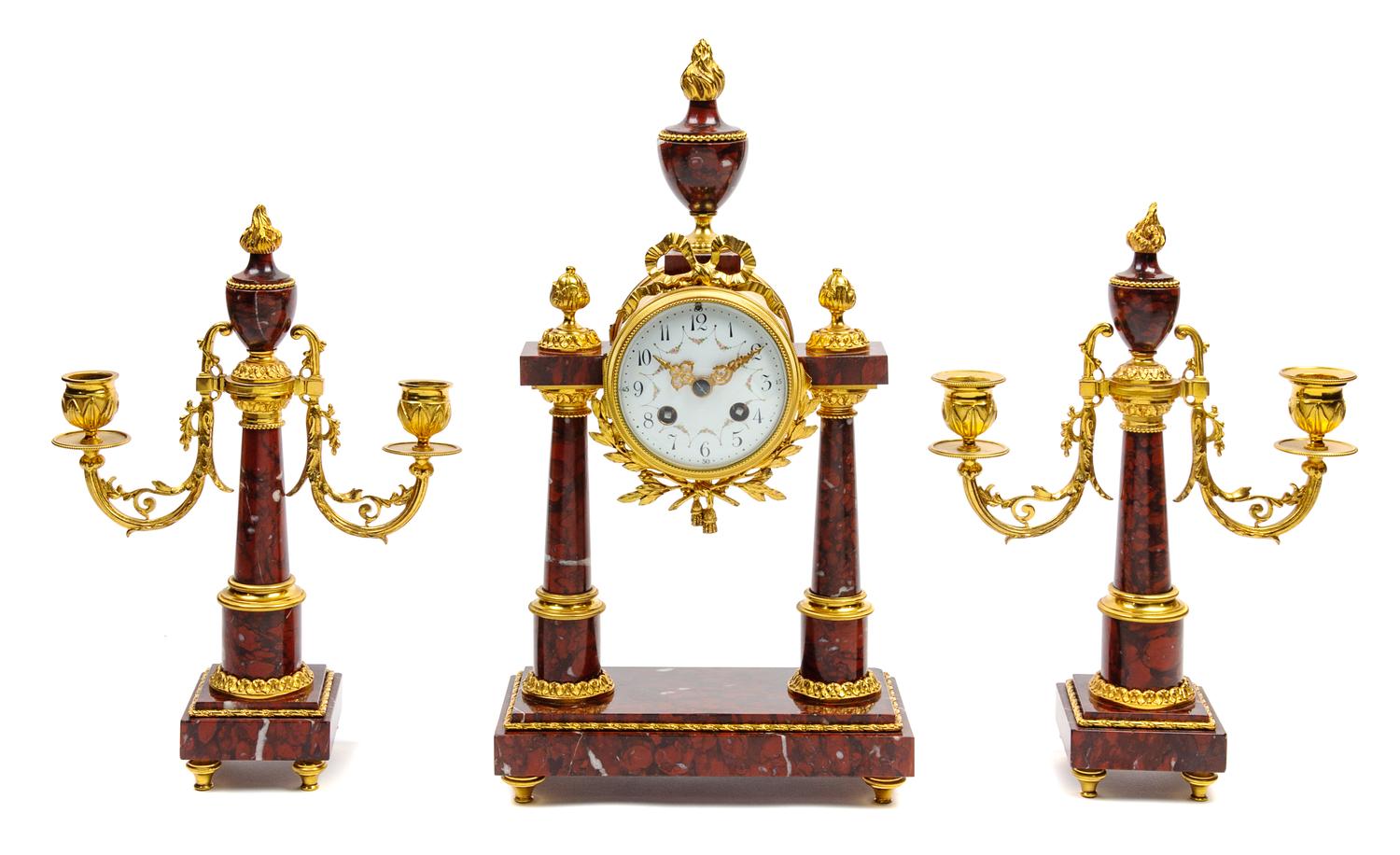 A French Gilt Bronze and Marble Clock Garniture Height of mantel clock 15 1/2 inches. — LATE 19TH CENTURY