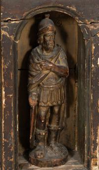 A Continental Baroque Carved Cassone with Carved Relief Panel