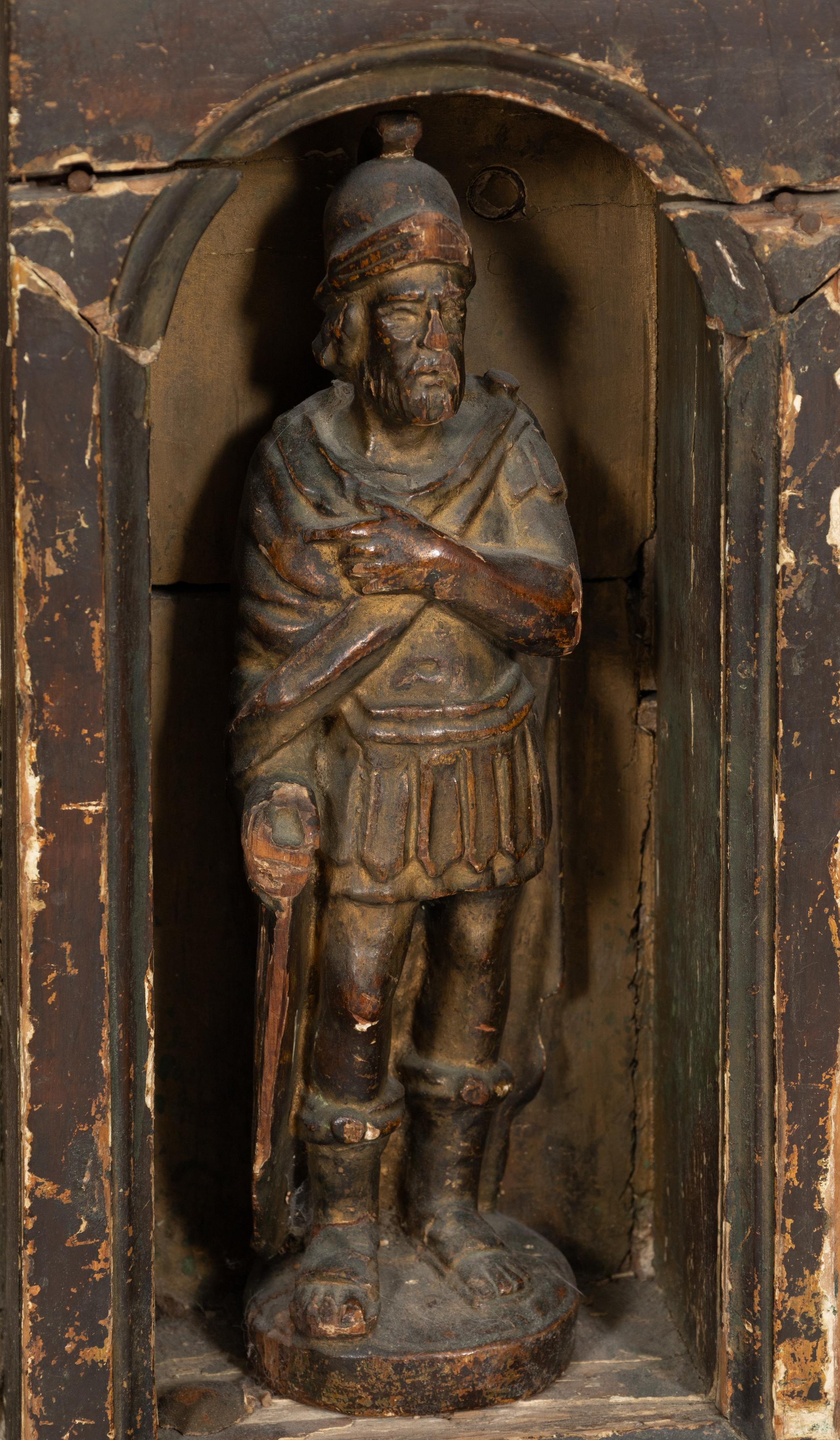A Continental Baroque Carved Cassone with Carved Relief Panel