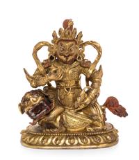 A Sino-Tibetan Gilt Bronze Figure of Kubera Height 4 1/2 inches. — 18TH CENTURY