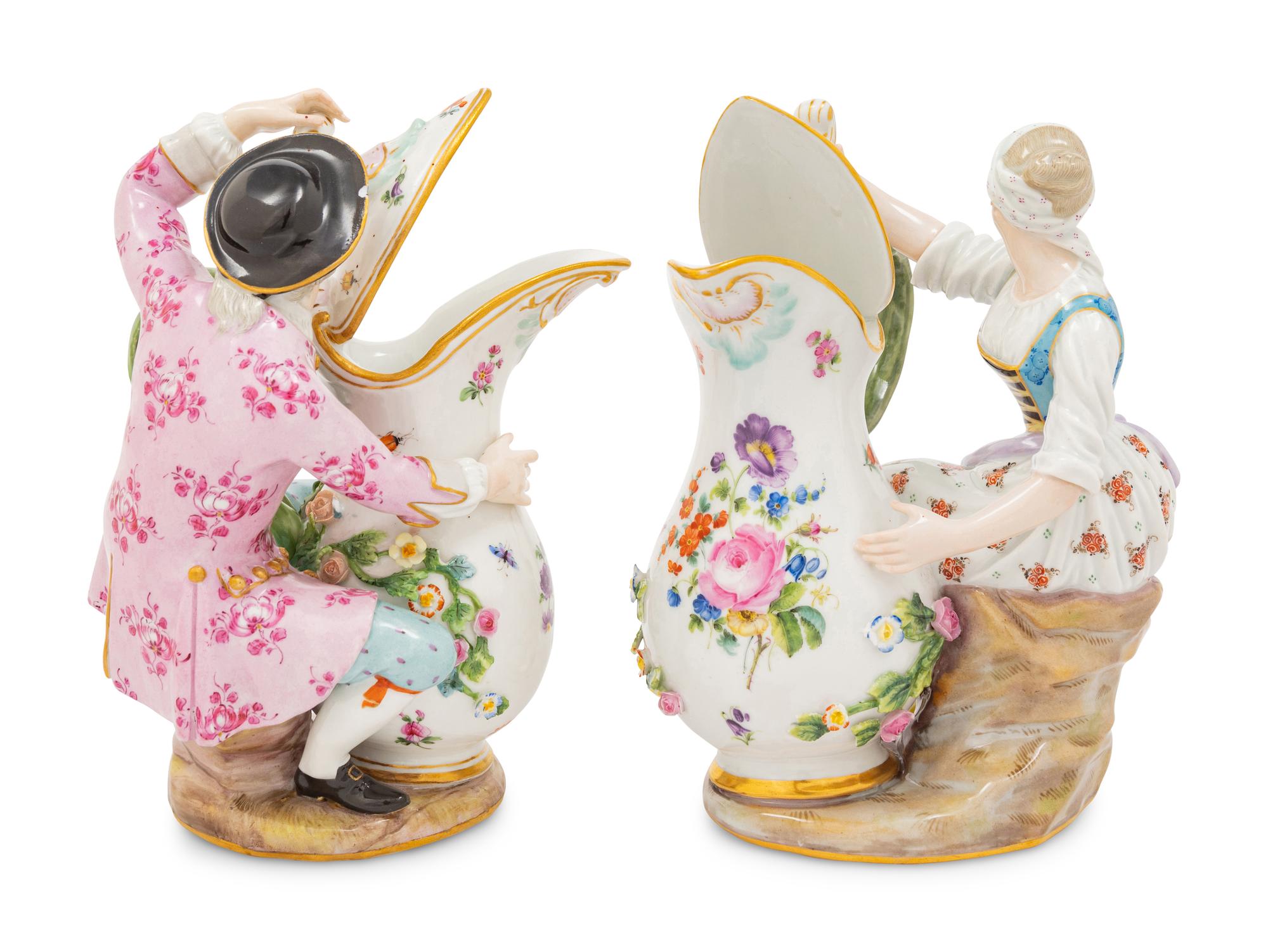 A Pair of Meissen Porcelain Figural Pitchers