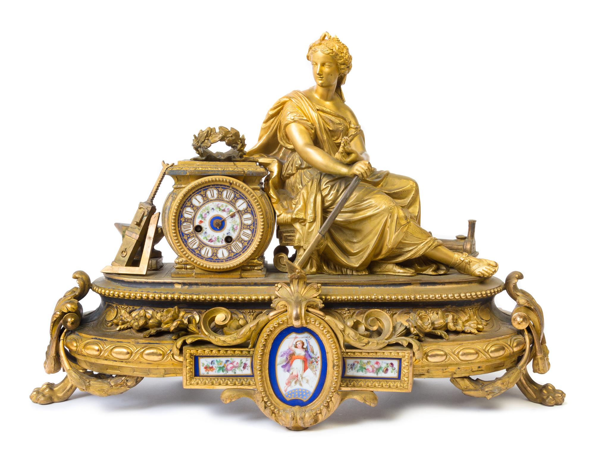A Napoleon III Porcelain Mounted Gilt Bronze Figural Mantel Clock Height 17 x width 24 3/4 x depth 9 inches. — 19TH CENTURY