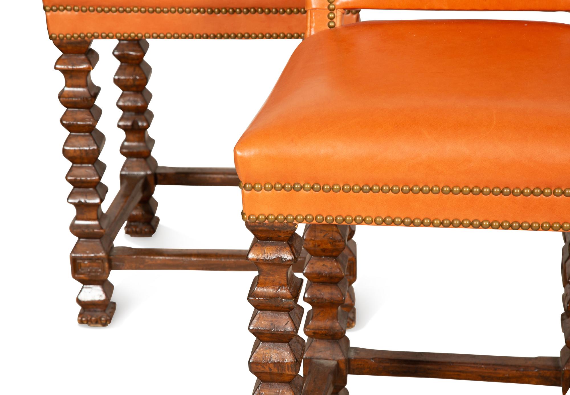 A Set of Five Contemporary Carved Oak and Leather Bar Stools