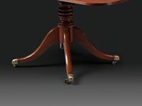 A Federal Mahogany Double Pedestal Extension Dining Table