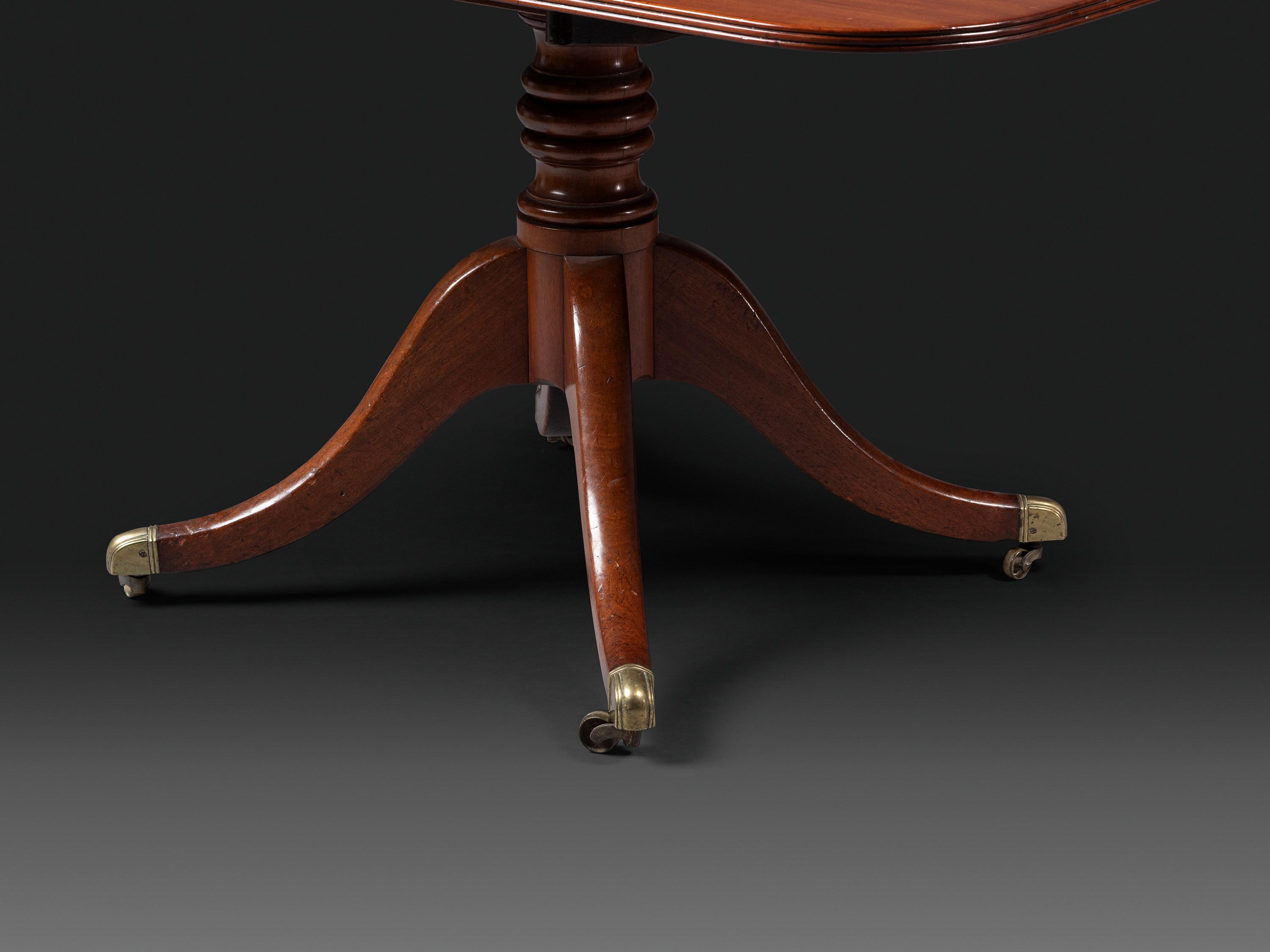 A Federal Mahogany Double Pedestal Extension Dining Table