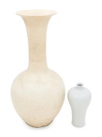 Two White Glazed Anhua Decorated Vases