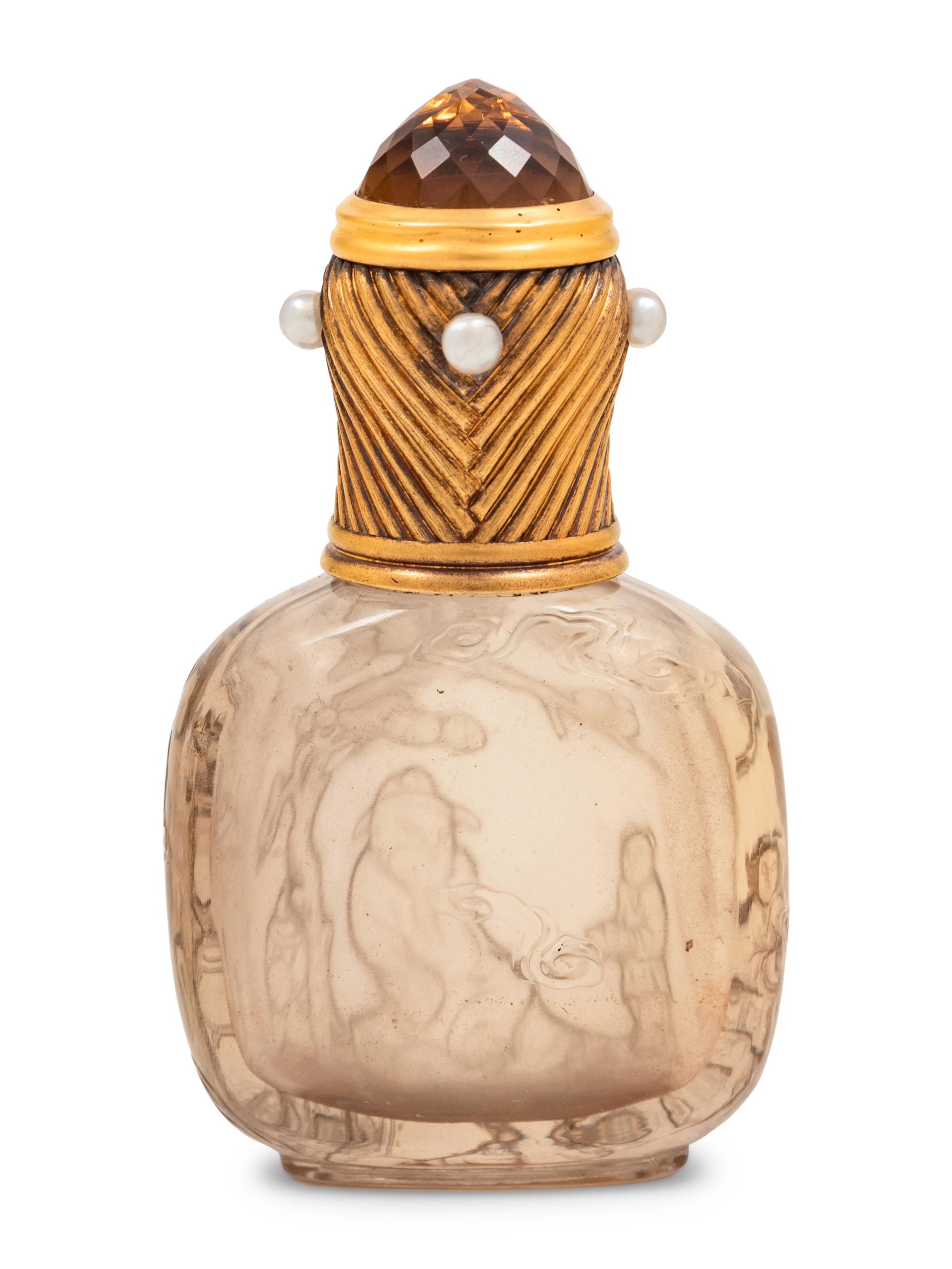 A Fabergé Yellow Gold and Pearl-Inset Mounted Carved Smokey Quartz Snuff Bottle