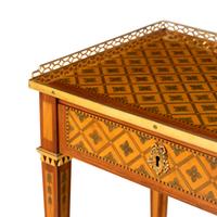 A Louis XVI Ormolu-Mounted Tulipwood, Sycamore and Boxwood Parquetry Table à Écrire