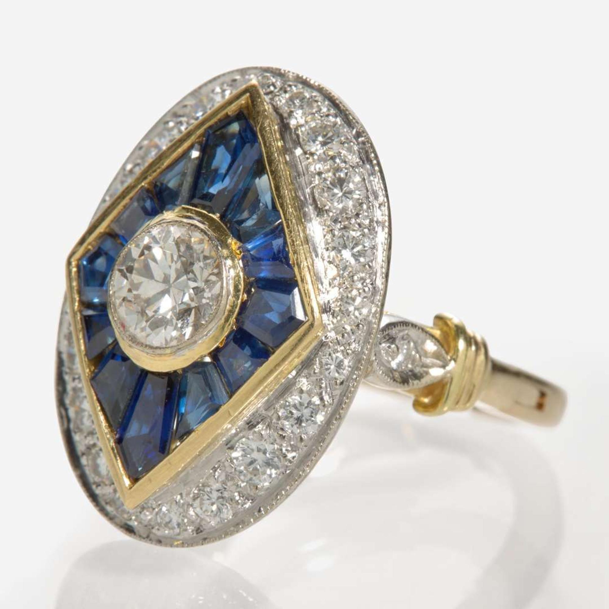 A 14K Yellow Gold, Diamond, and Sapphire Ring