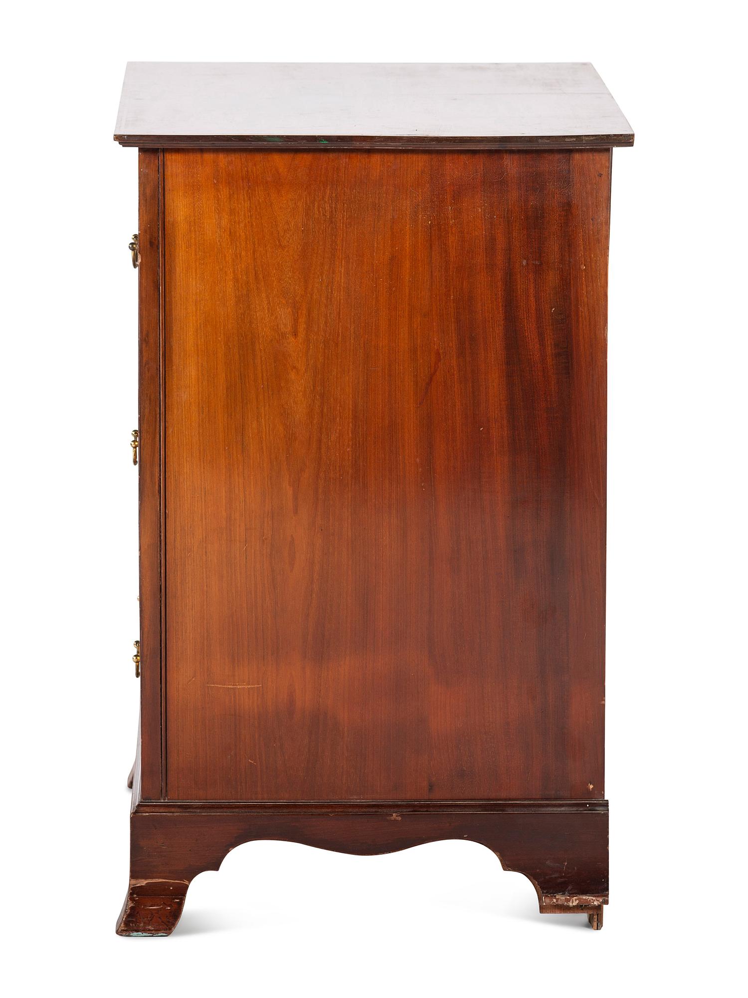 A Federal Style Inlaid Mahogany Chest of Drawers