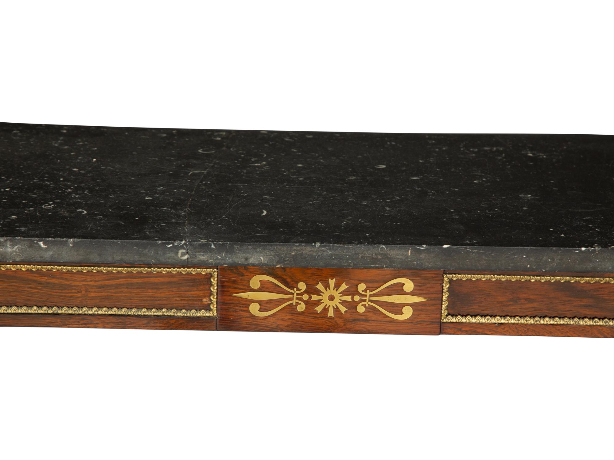 A Regency Style Mahogany and Parcel Gilt Console Table with Black Marble Top