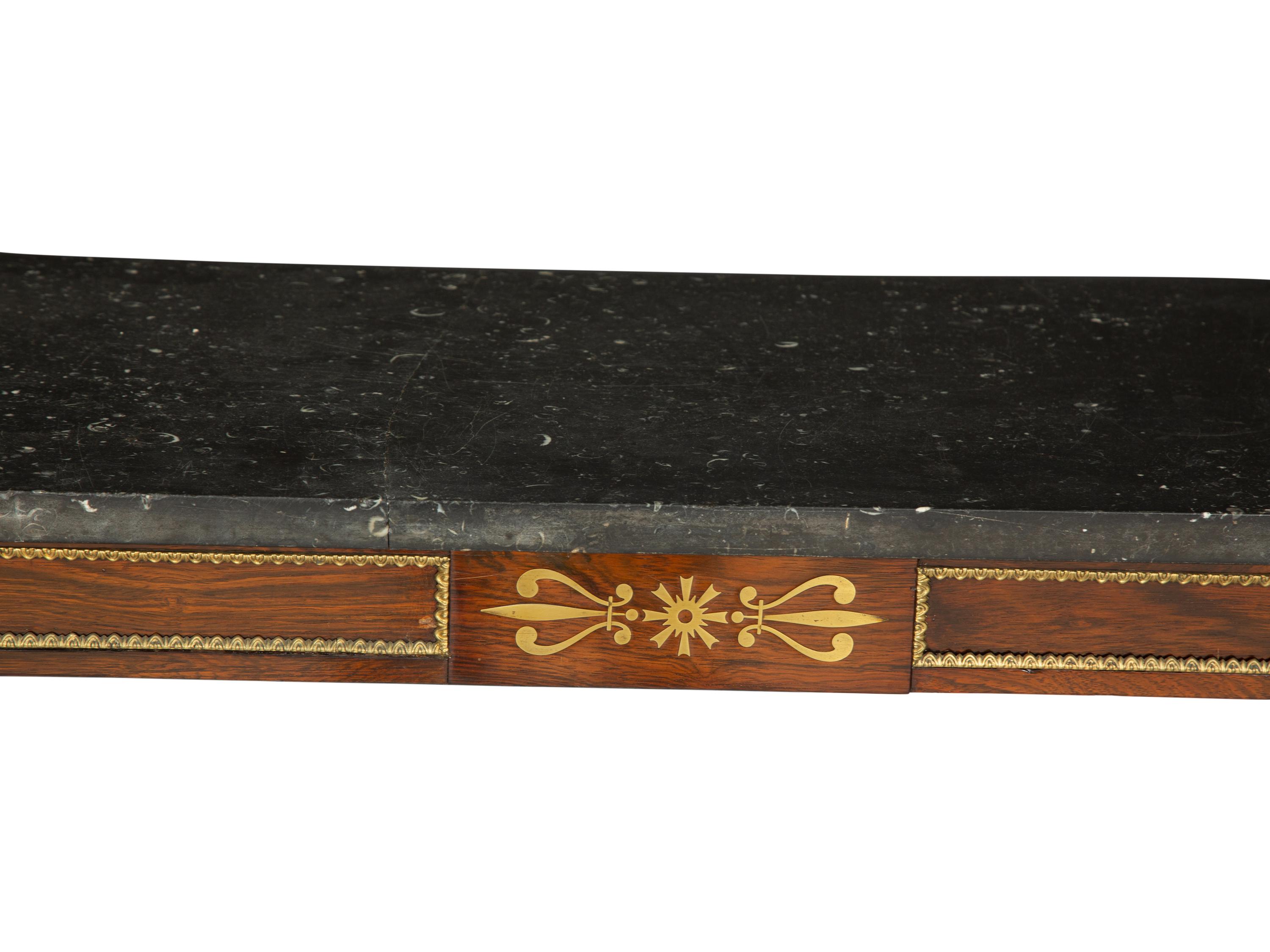 A Regency Style Mahogany and Parcel Gilt Console Table with Black Marble Top