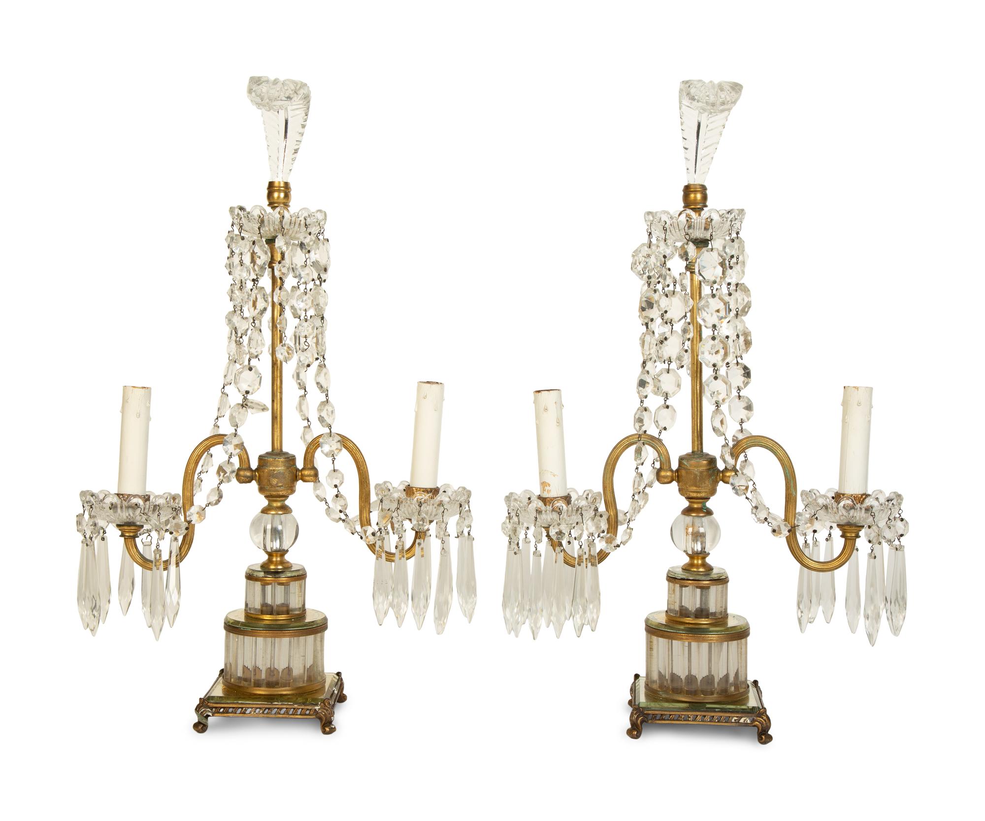 A Pair of Continental Gilt Metal and Glass Two-Light Candelabra