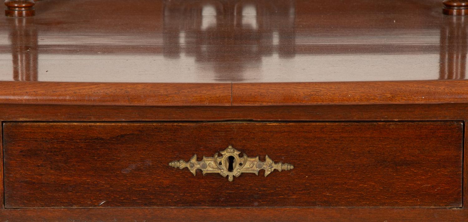 A Victorian Mahogany Lady's Writing Table with Shelf