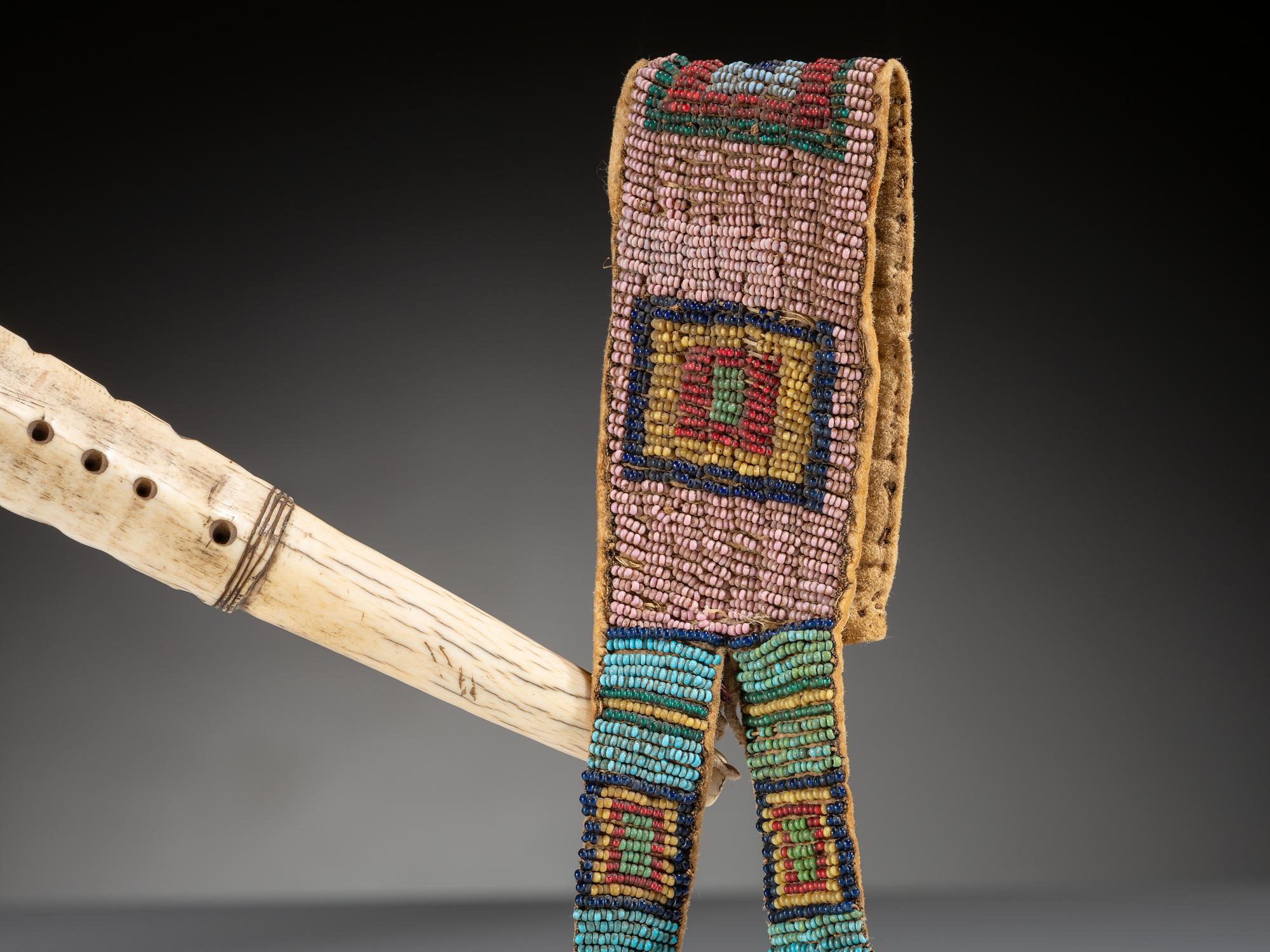 Northern Plains Elk Antler Quirt, with Beaded Buffalo Hide Wrist Strap