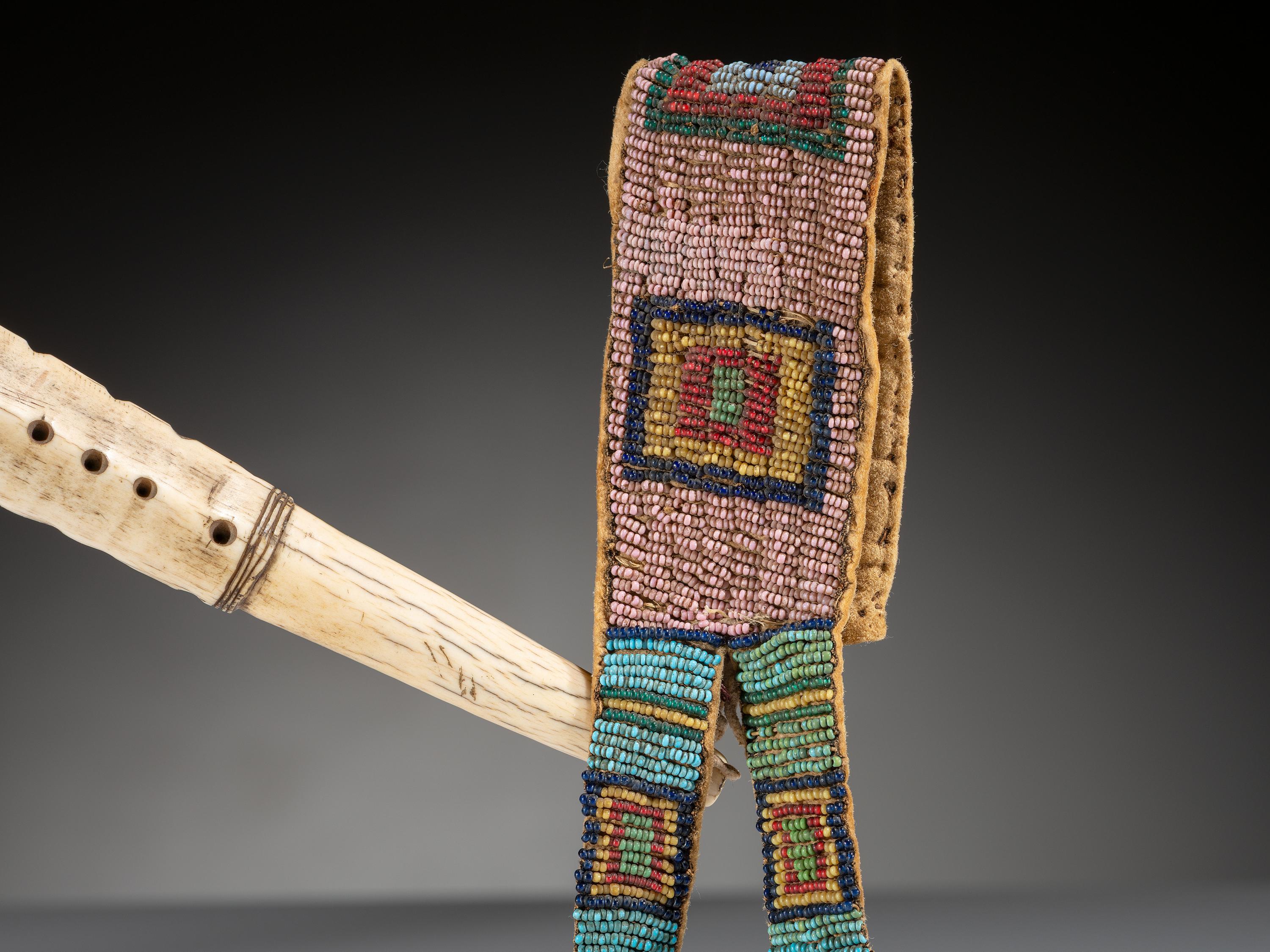 Northern Plains Elk Antler Quirt, with Beaded Buffalo Hide Wrist Strap