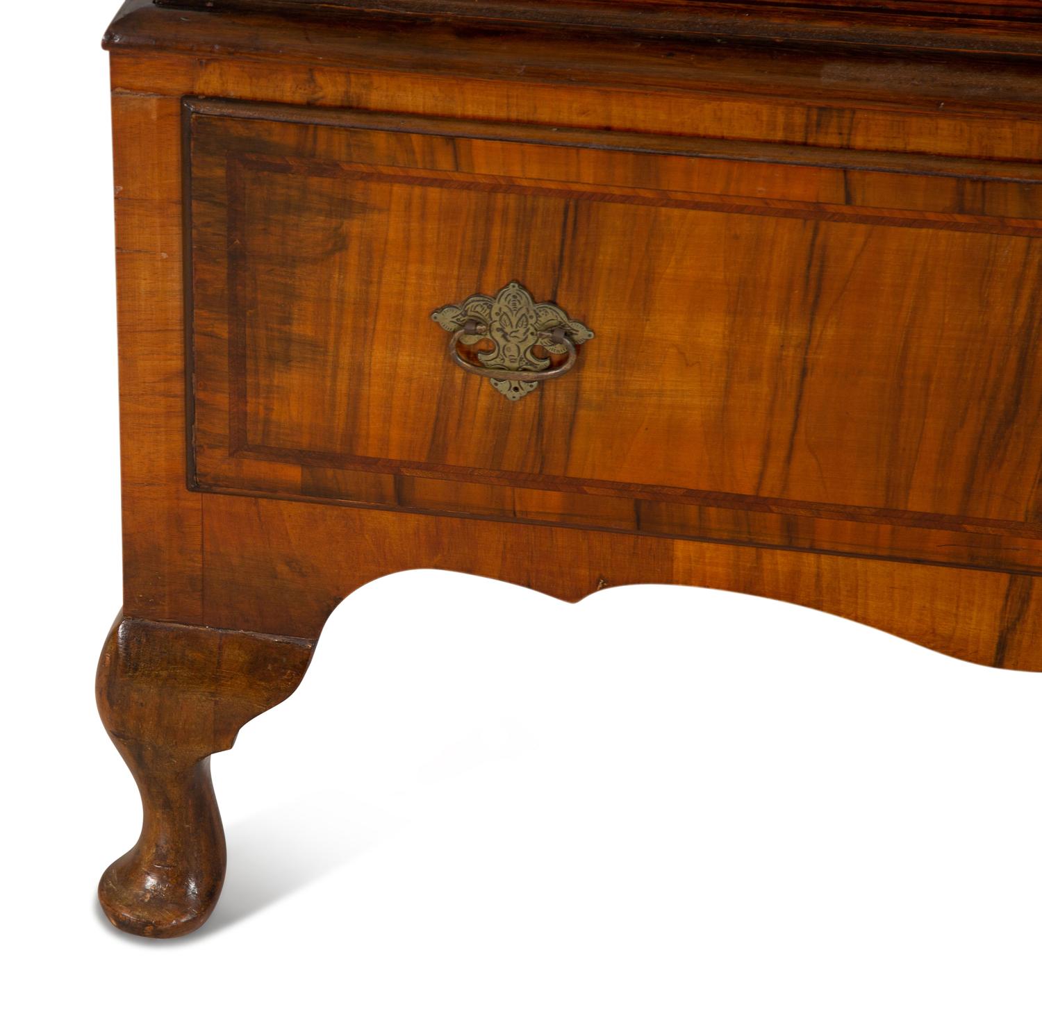 A Queen Anne Figured Mahogany Chest on Stand