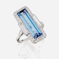 An aquamarine, diamond, and platinum ring