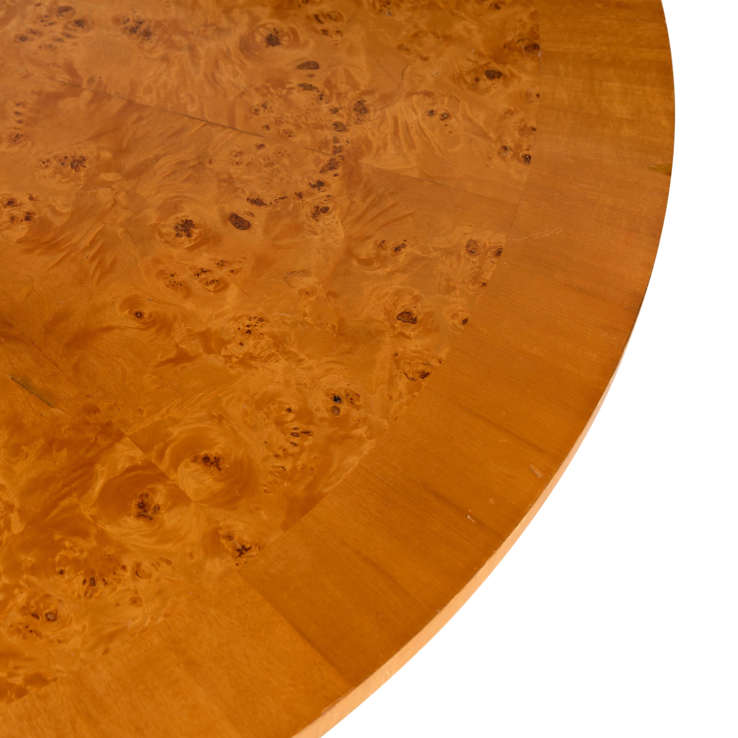 A Biedermeier Style Parcel Ebonized Figured Birch Center Table