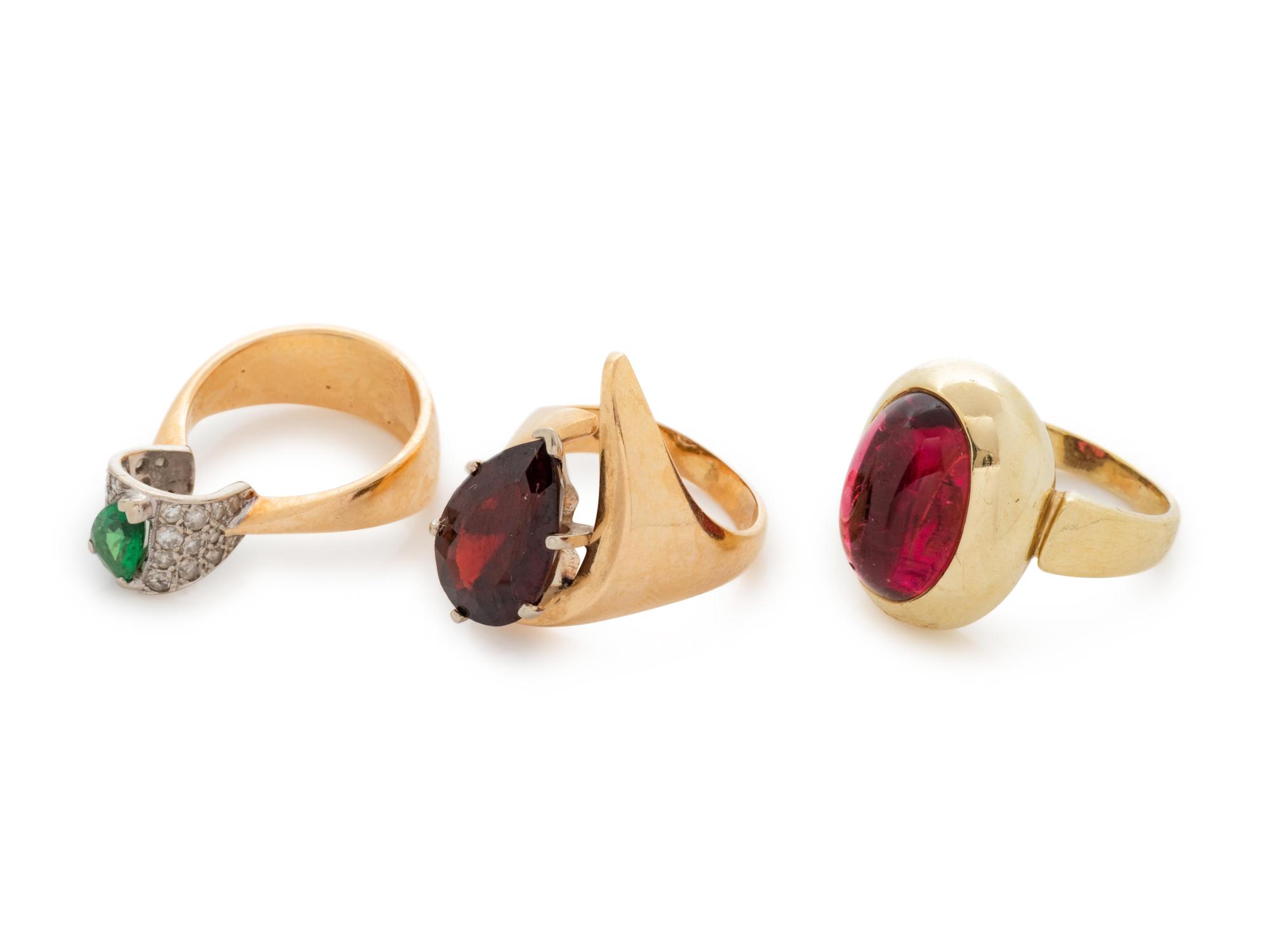 A Collection of 14 Karat Yellow Gold and Gemstone Rings,