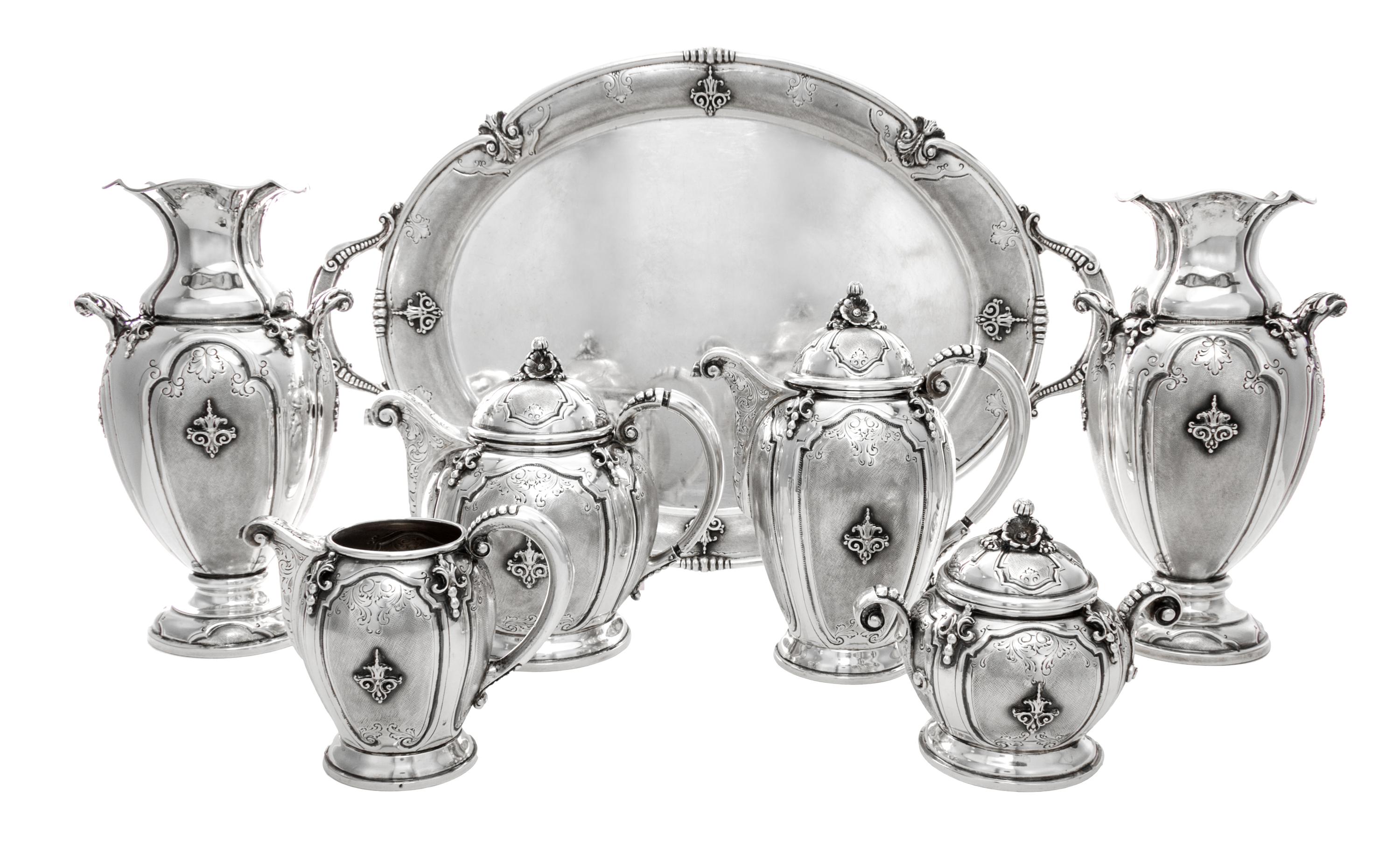 An Italian Silver Seven-Piece Tea and Coffee Service, Valle & Gandini for Fornari, Milan, Mid-20th Century, comprising a teapot, a coff