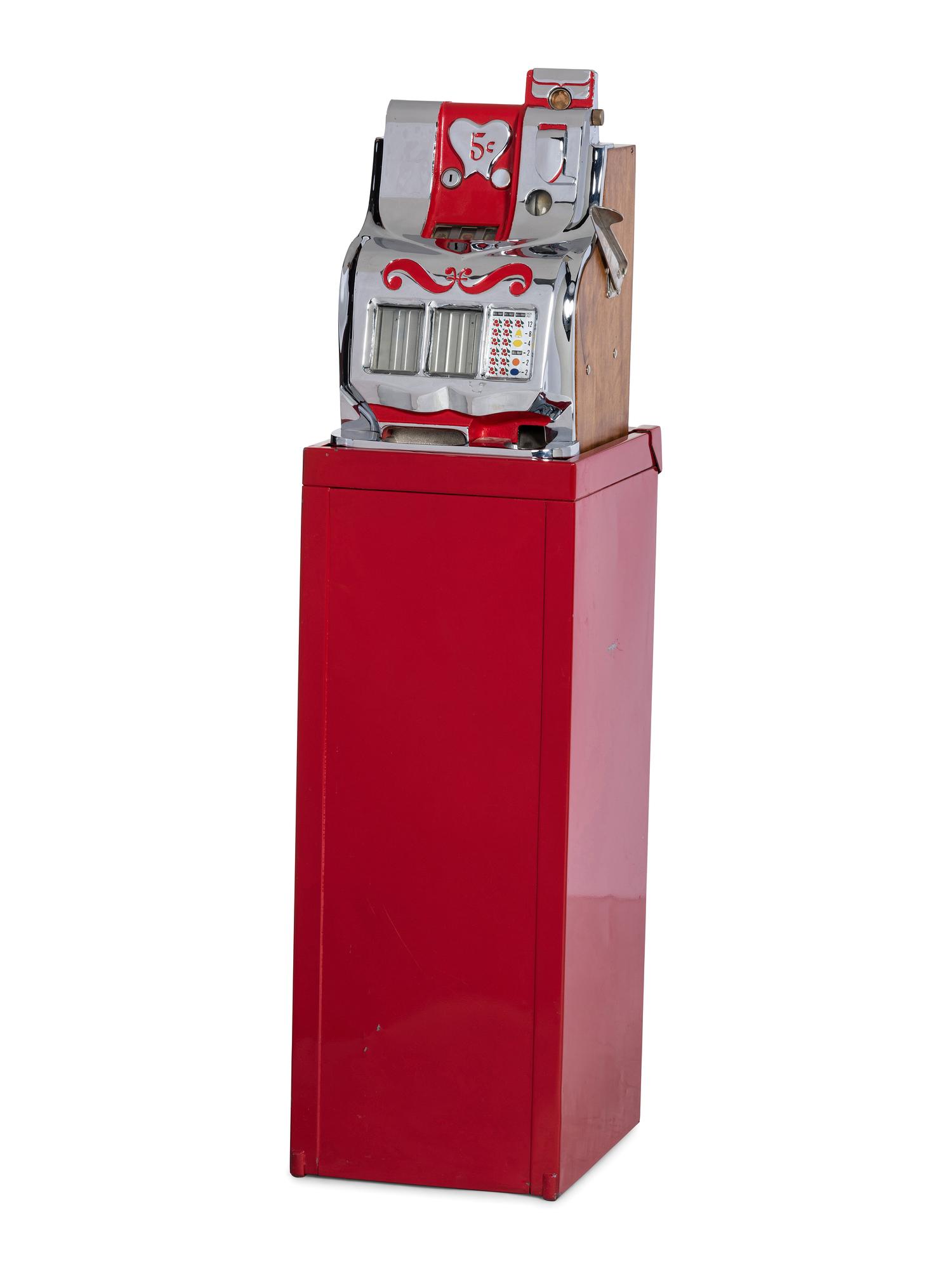 A Mills 'Sweetheart' Five Cent Slot Machine on Stand