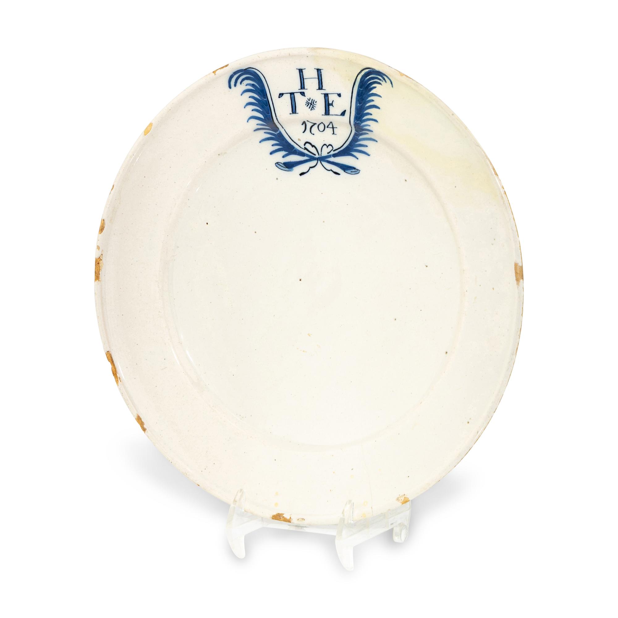 An English Delftware ' Marriage' Plate