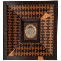 [EARLY PHOTOGRAPHY - PORTRAITURE]. A group of 4 framed daguerreotypes of male and female subjects, including: