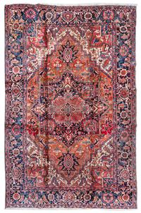 A Heriz Wool Rug 11 feet 2 inches x 7 feet 7 inches. — CIRCA 1920