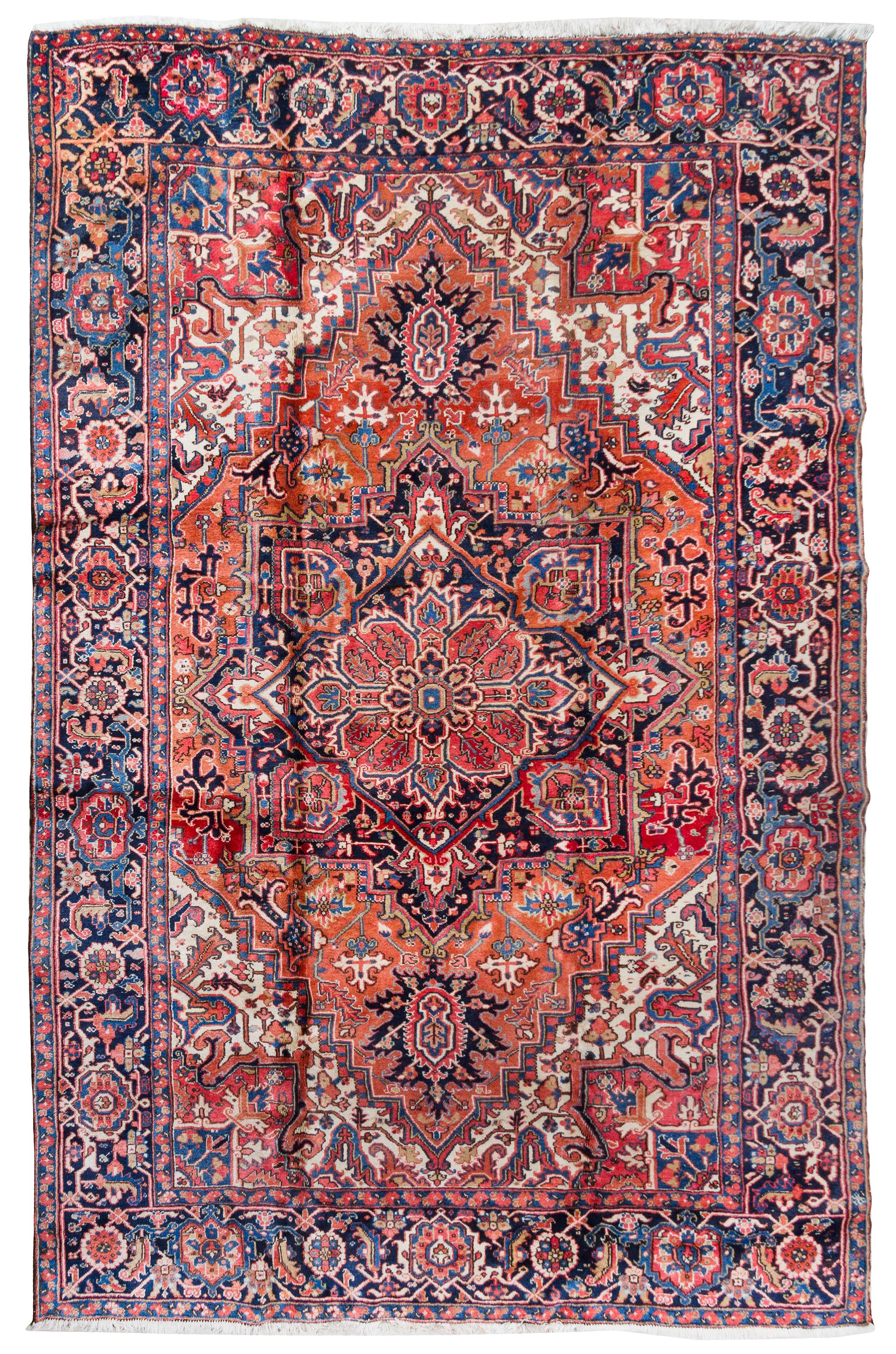 A Heriz Wool Rug 11 feet 2 inches x 7 feet 7 inches. — CIRCA 1920