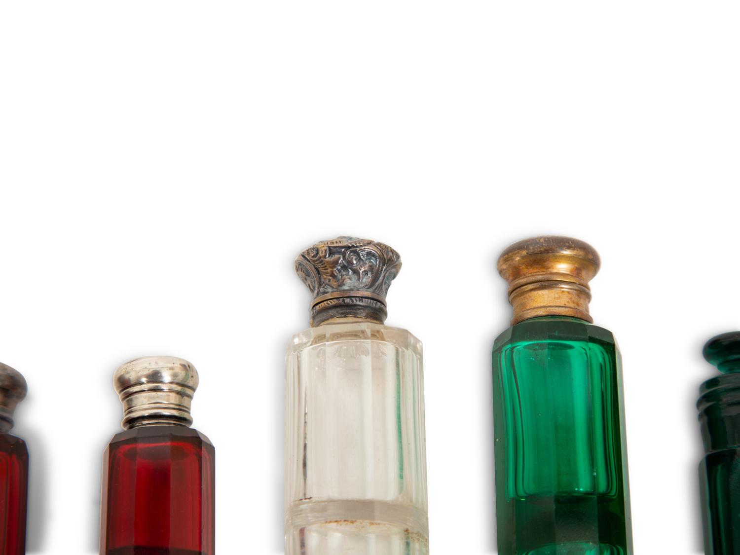 Eight English Silver or Brass-Mounted Glass Scent Bottles