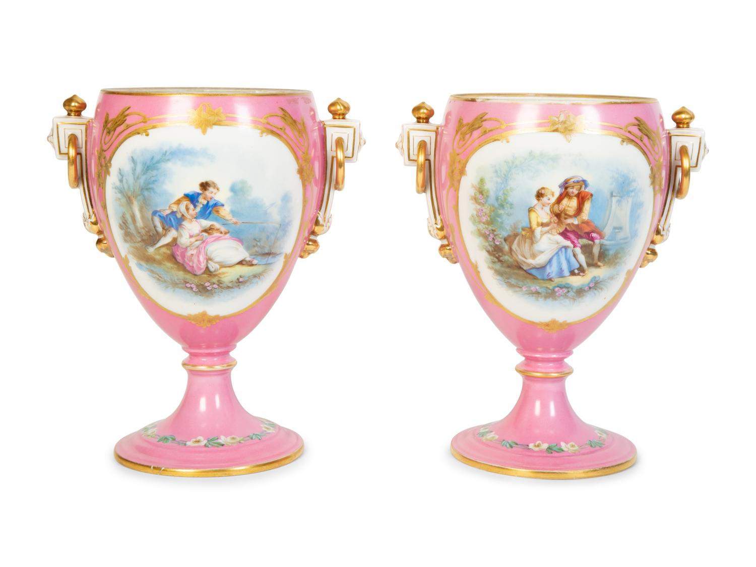 A Pair of Sèvres Style Porcelain Urns