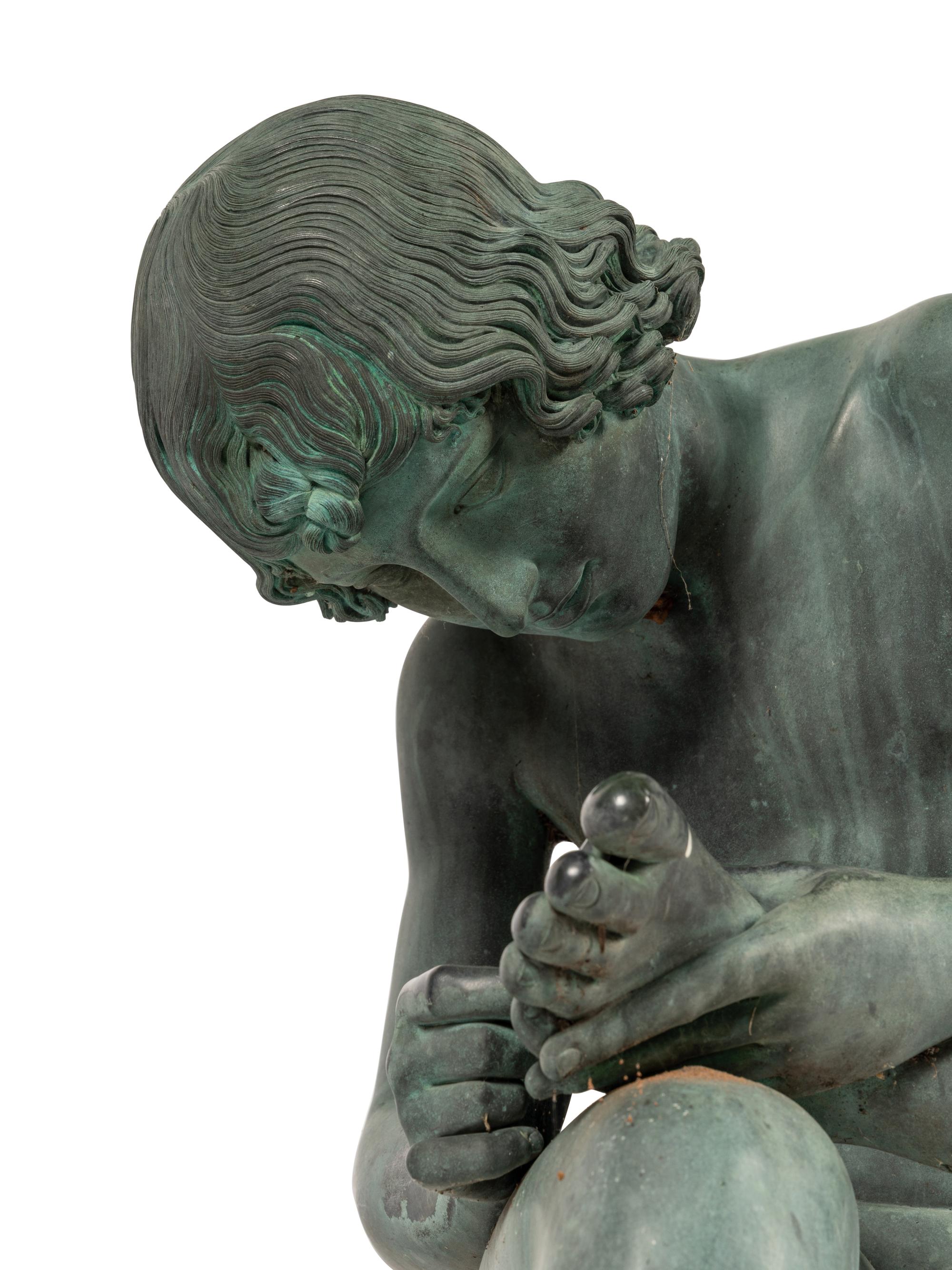 A Patinated Bronze Figure of the Spinario