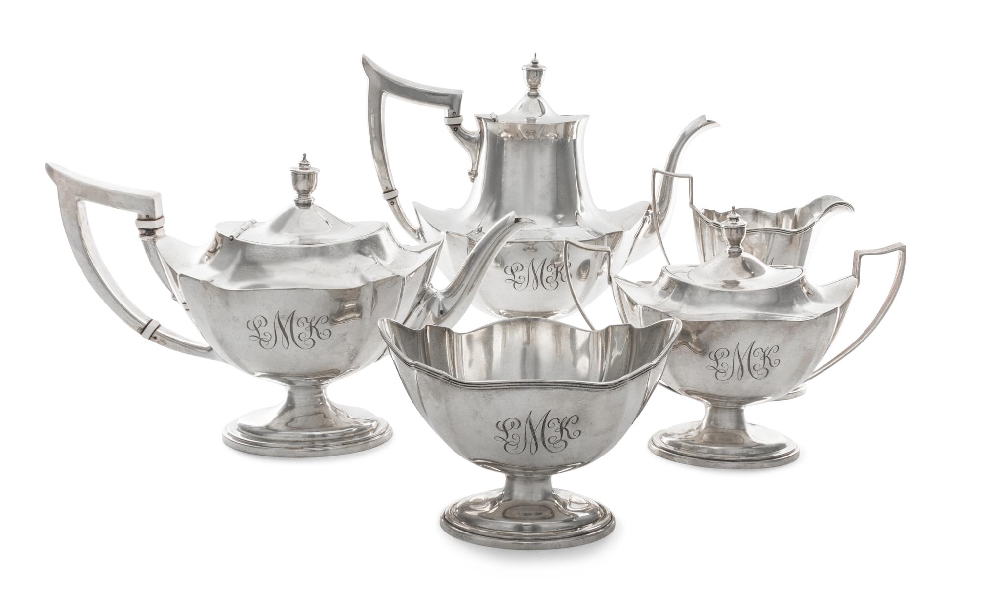 An American Silver Tea and Coffee Service, Gorham Mfg. Co., Providence, RI, Plymouth pattern, comprising a tea pot, a coffee pot, a cre