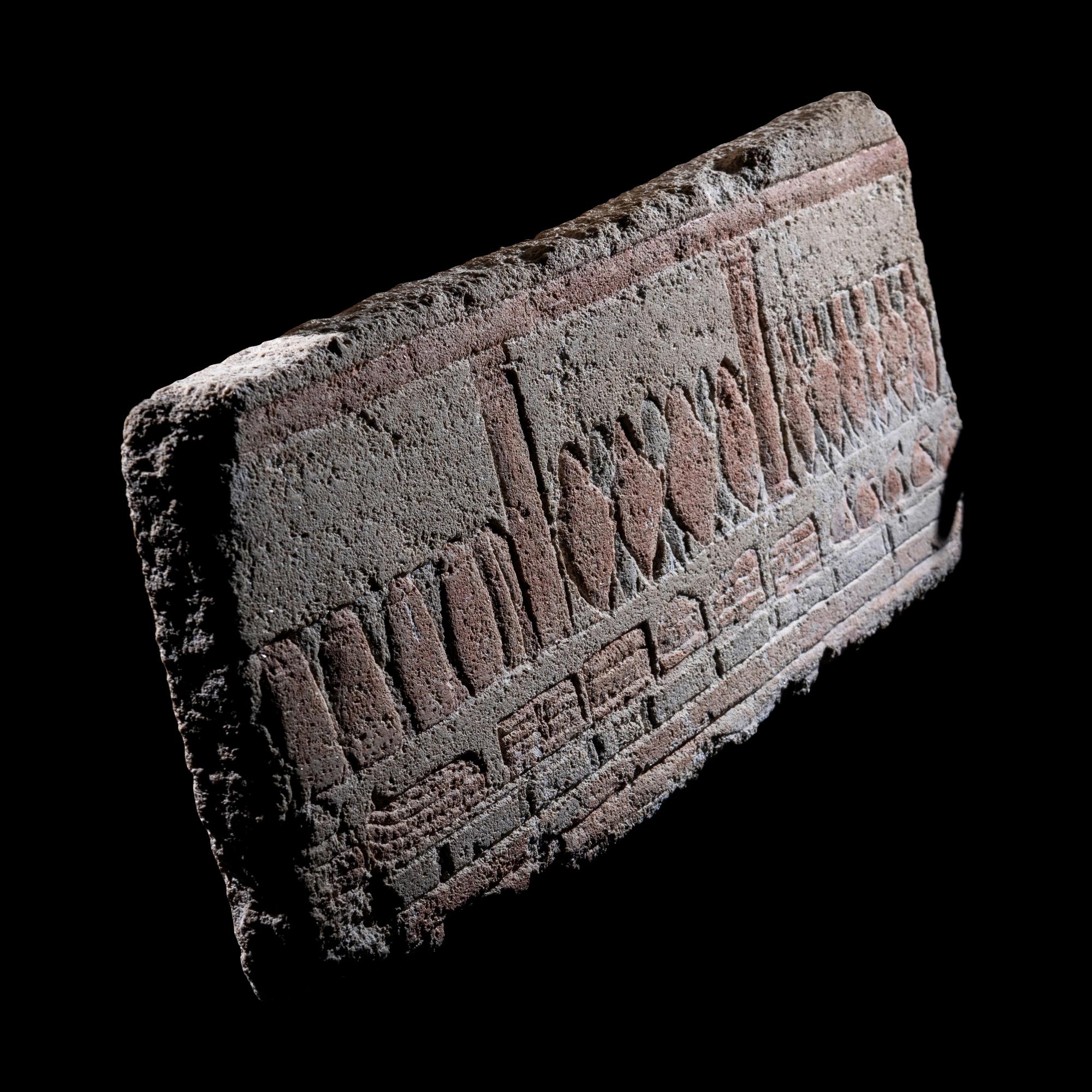 An Egyptian Polychrome Relief with Offering to the Aten