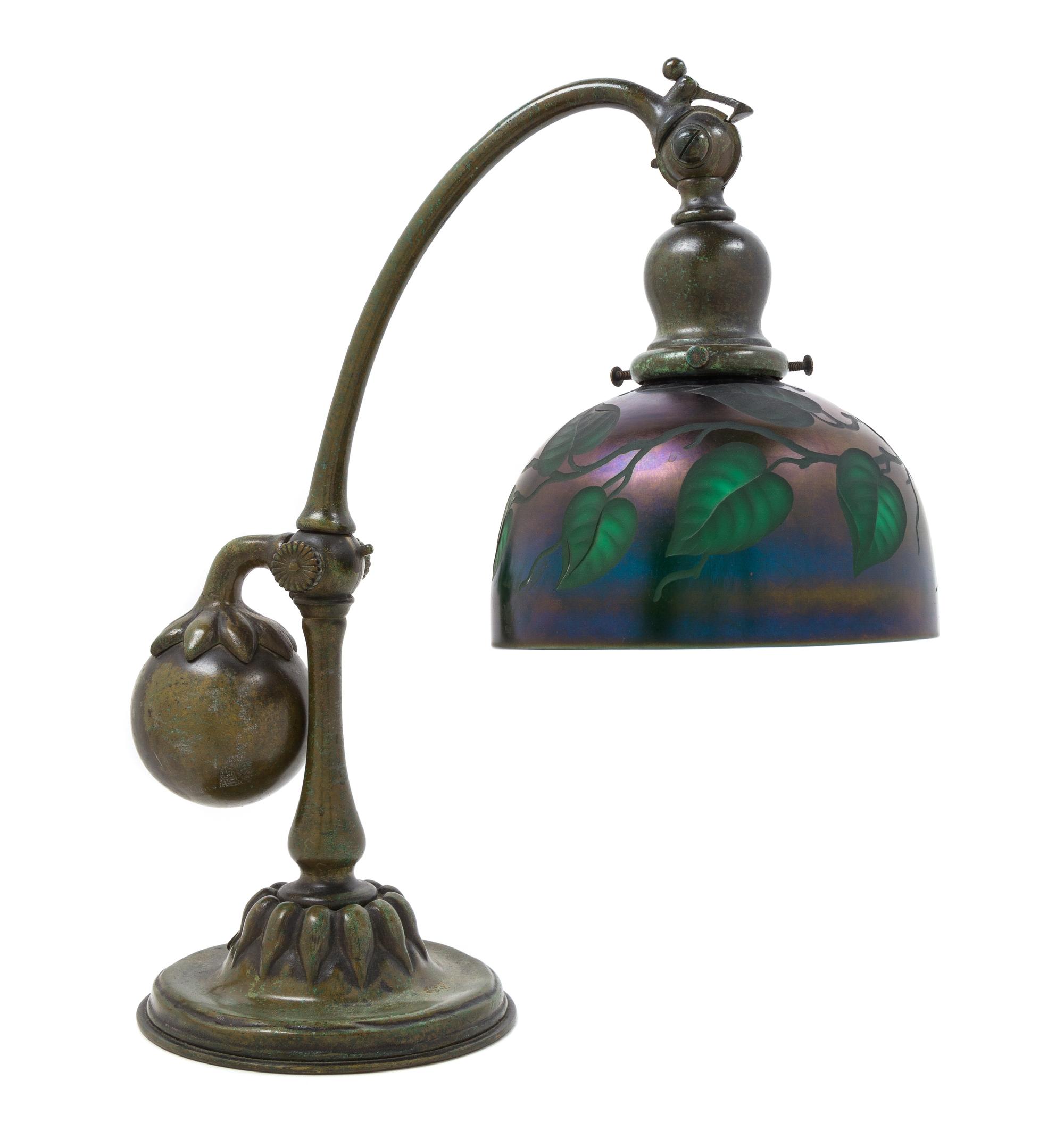 A Tiffany Studios Favrile Glass and Bronze Counter Balance Lamp Height 15 inches.