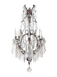 A Continental Cast Metal and Cut Glass Five-Light Chandelier