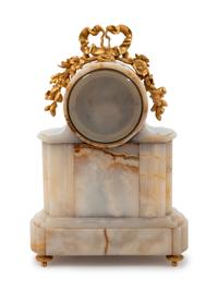 A Louis XVI Style Gilt Bronze Mounted Onyx Mantel Clock