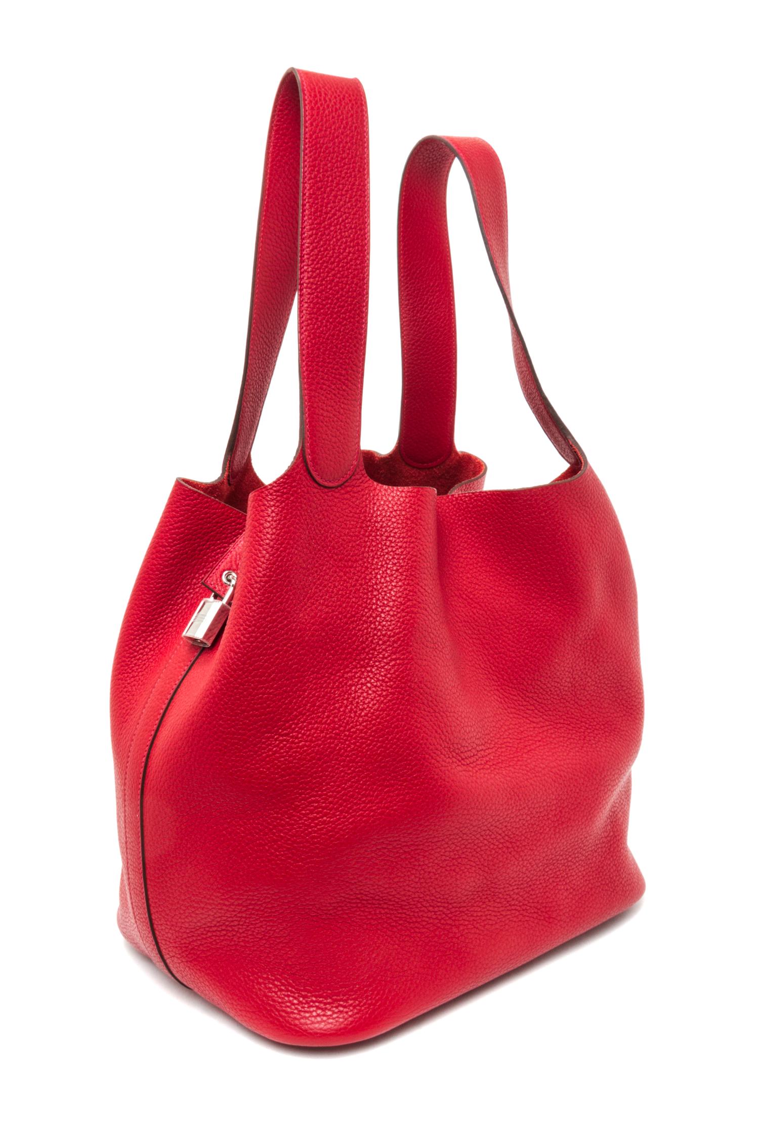 An Hermes Rouge Casaque Taurillon Clemence Picotin Lock TGM Handbag, 13" x 13" x 9".